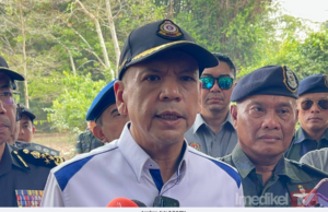 ANGGOTA POLIS DITEMPATKAN DI STESEN MINYAK