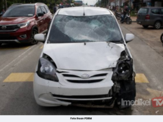 WANITA MAUT MOTOSIKAL BERTEMBUNG KERETA